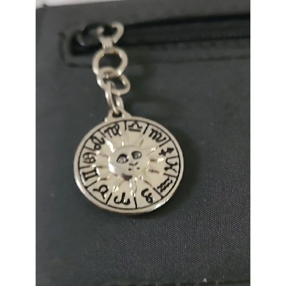 Womens Classic Black Wallet with Front Zip and Zodiac Charm